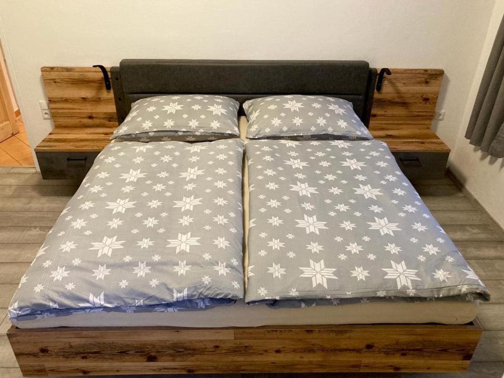 Postel nebo postele na pokoji v ubytování Haus Obernig