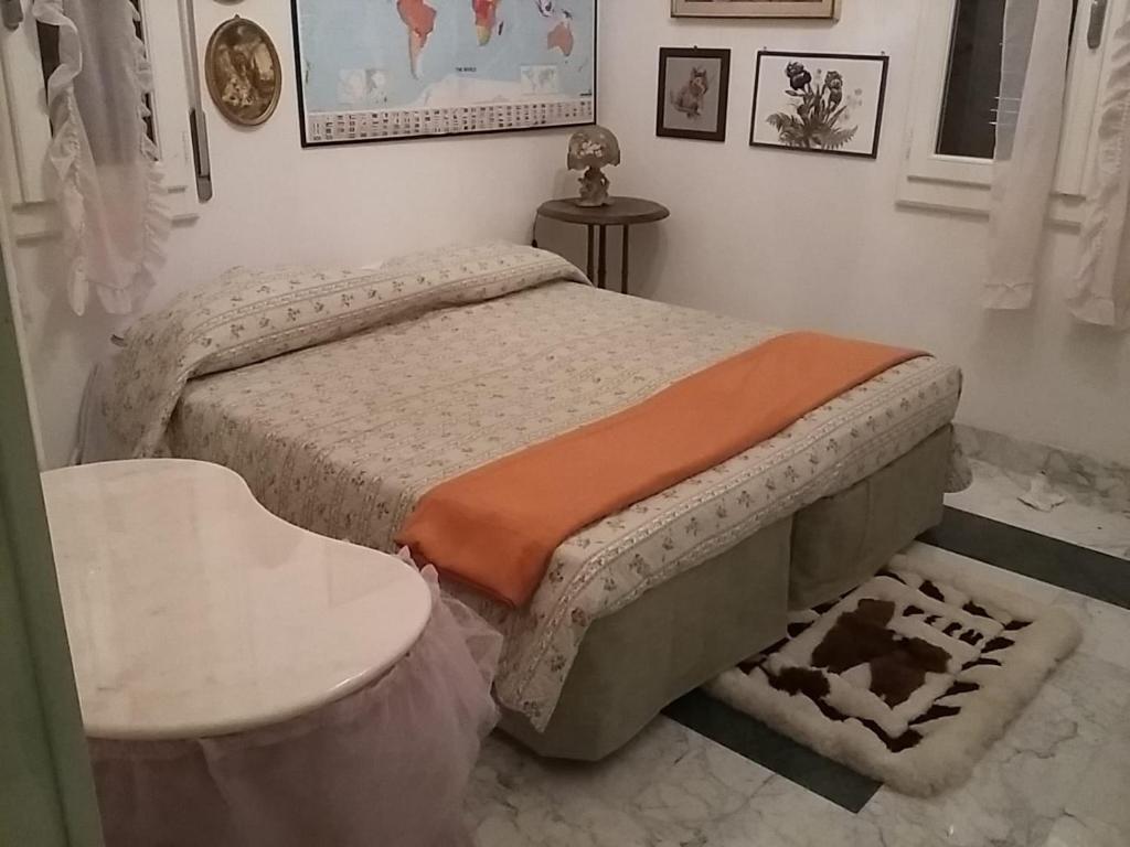 Postel nebo postele na pokoji v ubytování Antico '900