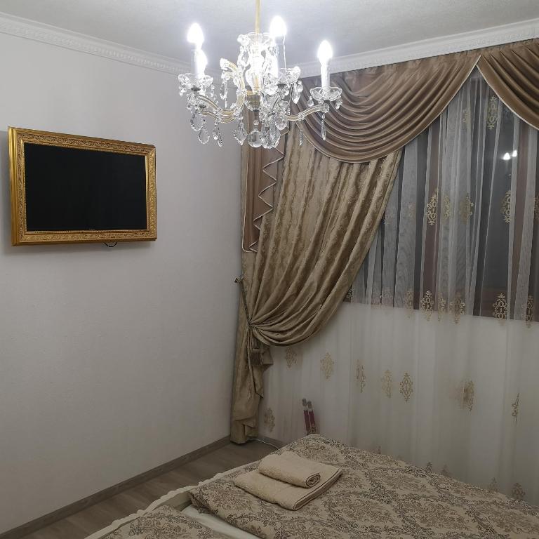 Postel nebo postele na pokoji v ubytování Ikonomov House