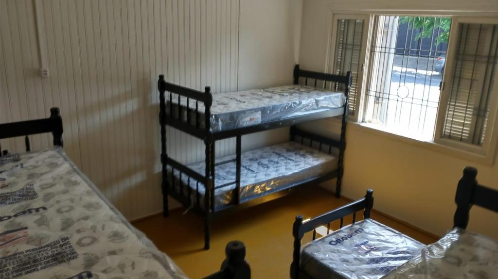 Krevet ili kreveti na kat u jedinici u objektu Casarão das Figueiras