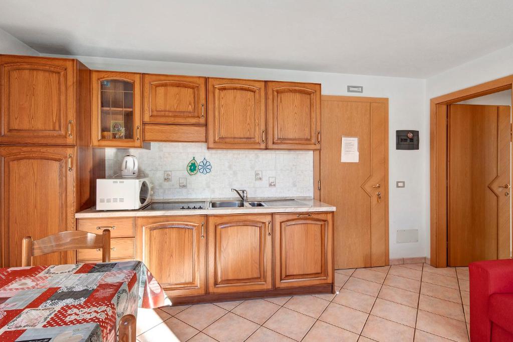 A kitchen or kitchenette at Appartamento Vago