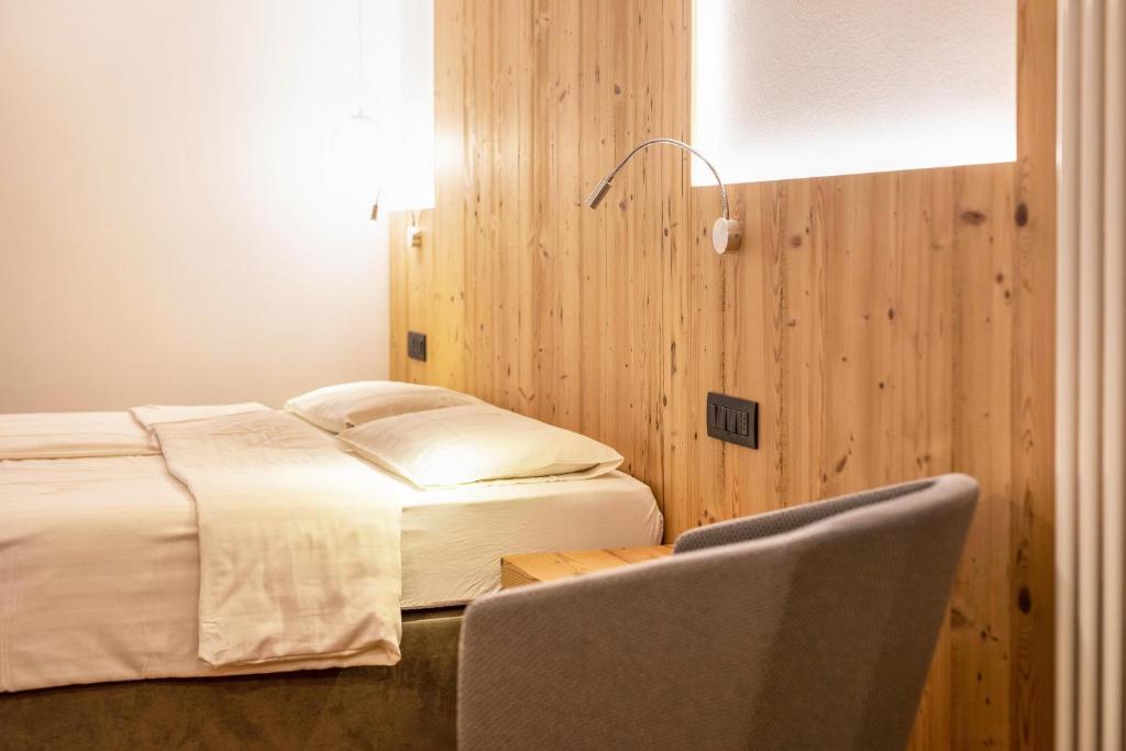 Postel nebo postele na pokoji v ubytování Chalet Osmar Suite 2