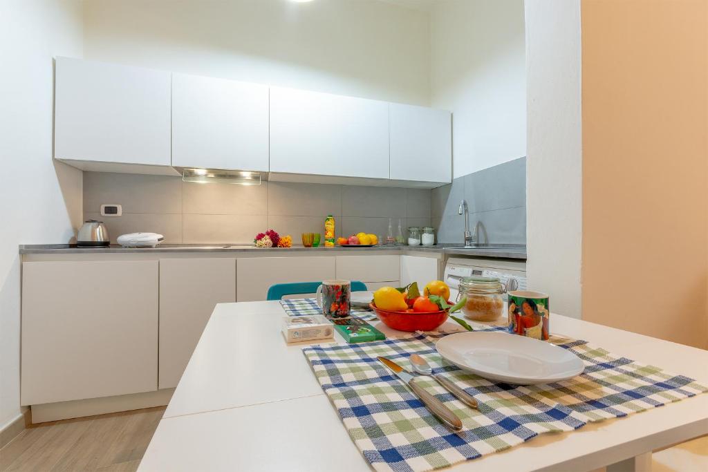 Kuchyňa alebo kuchynka v ubytovaní L'APPARTEMENT DE PAOLO