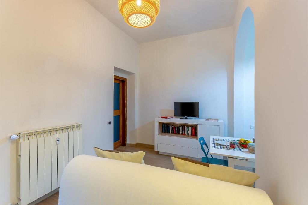 Televízia a/alebo spoločenská miestnosť v ubytovaní L'APPARTEMENT DE PAOLO