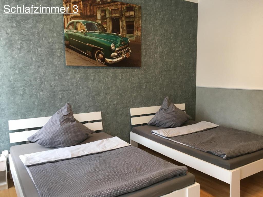 Cama o camas de una habitación en Ferienwohnung RIENA