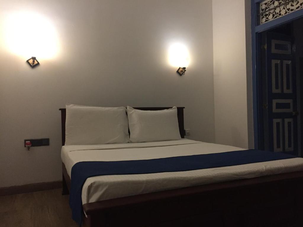 Postel nebo postele na pokoji v ubytování Cinnamon Heaven