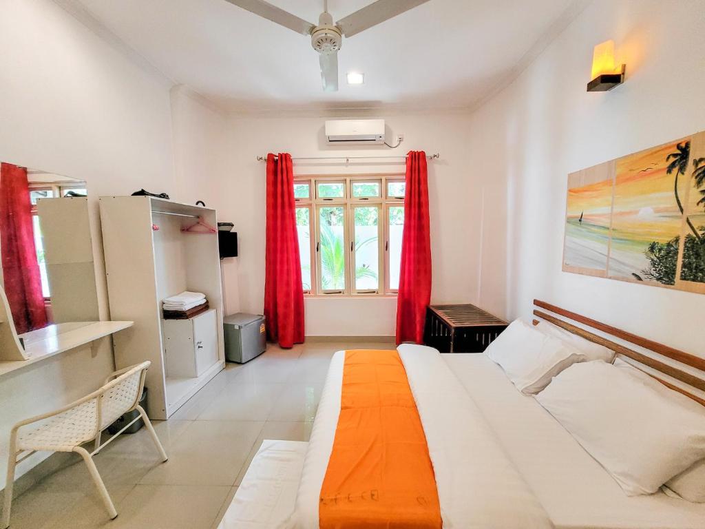 Postel nebo postele na pokoji v ubytování Alesara Guest House