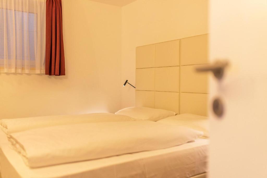 Posteľ alebo postele v izbe v ubytovaní Apartment Ön Residence Bun Ste