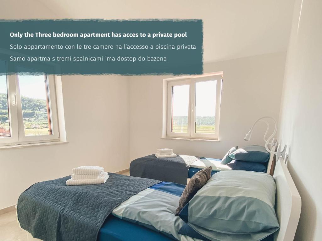 Postel nebo postele na pokoji v ubytování Salinea Apartments