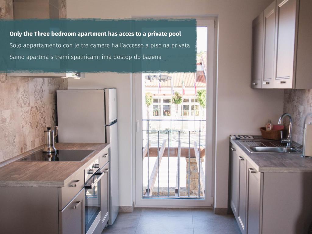 Kuchyň nebo kuchyňský kout v ubytování Salinea Apartments