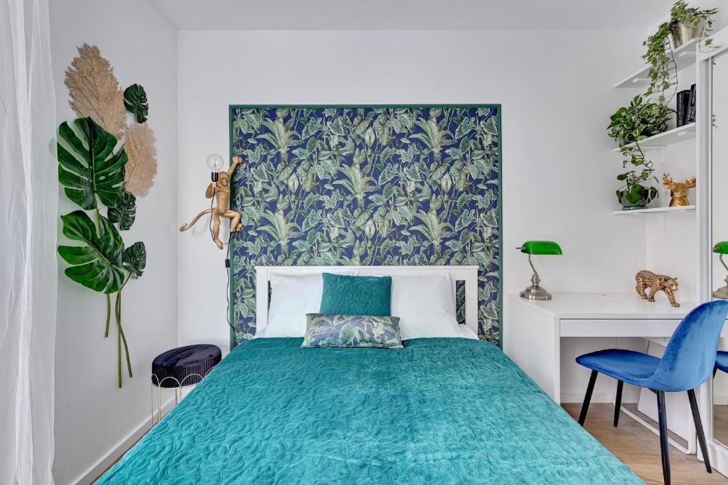 Posteľ alebo postele v izbe v ubytovaní Anchor Apartments JUNGLA