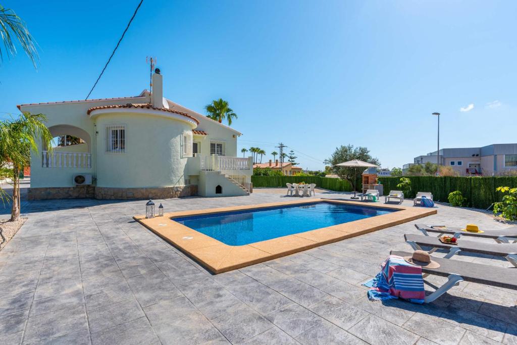 Bazén v ubytování Villa Escriva - PlusHolidays nebo v jeho okolí