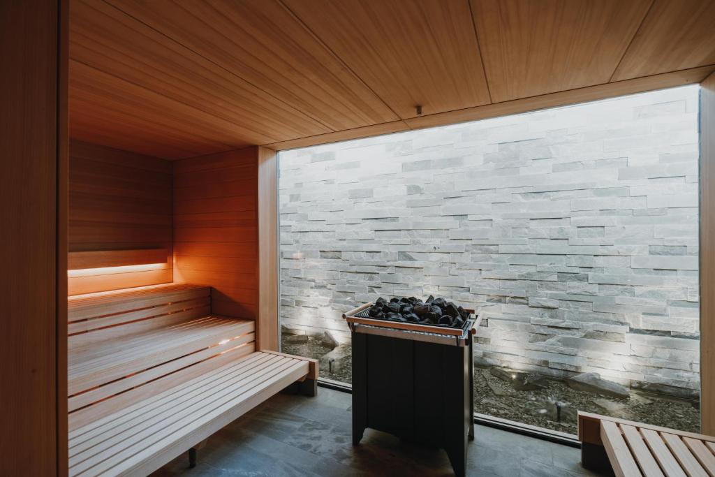 Postel nebo postele na pokoji v ubytování Parkhotel Egerner Höfe