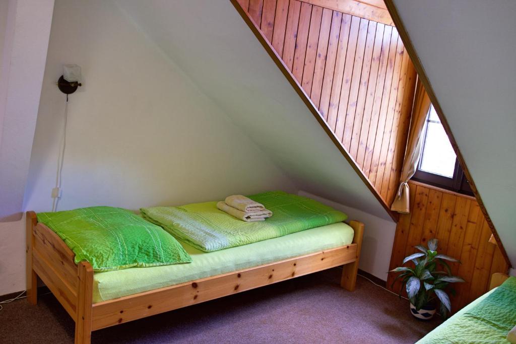 Postel nebo postele na pokoji v ubytování Penzion na Zborově