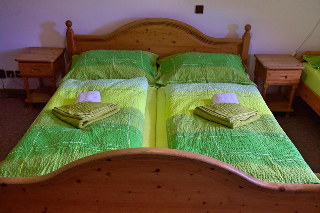 Postel nebo postele na pokoji v ubytování Penzion na Zborově
