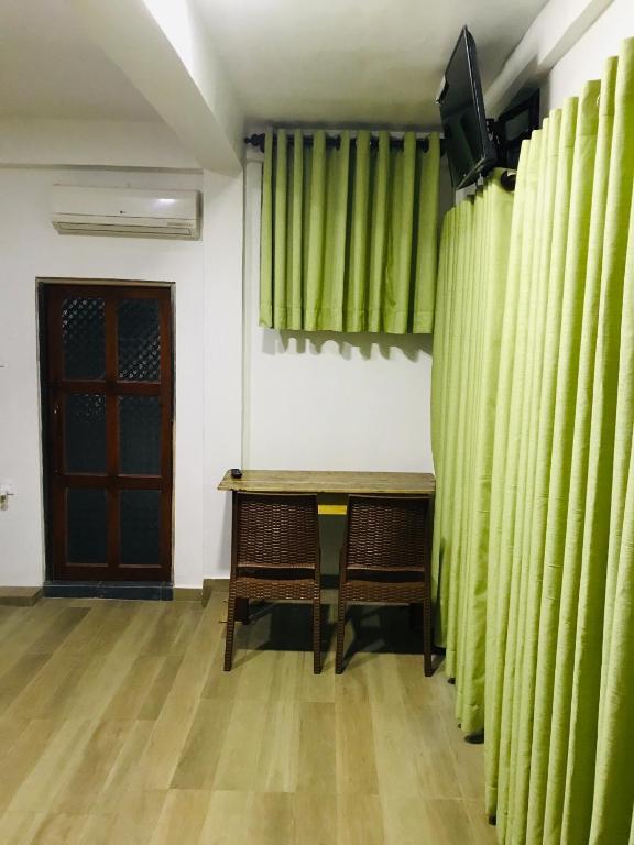 TV a/nebo společenská místnost v ubytování Ritigala Hideaway
