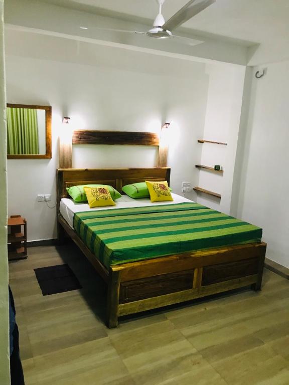 Postel nebo postele na pokoji v ubytování Ritigala Hideaway