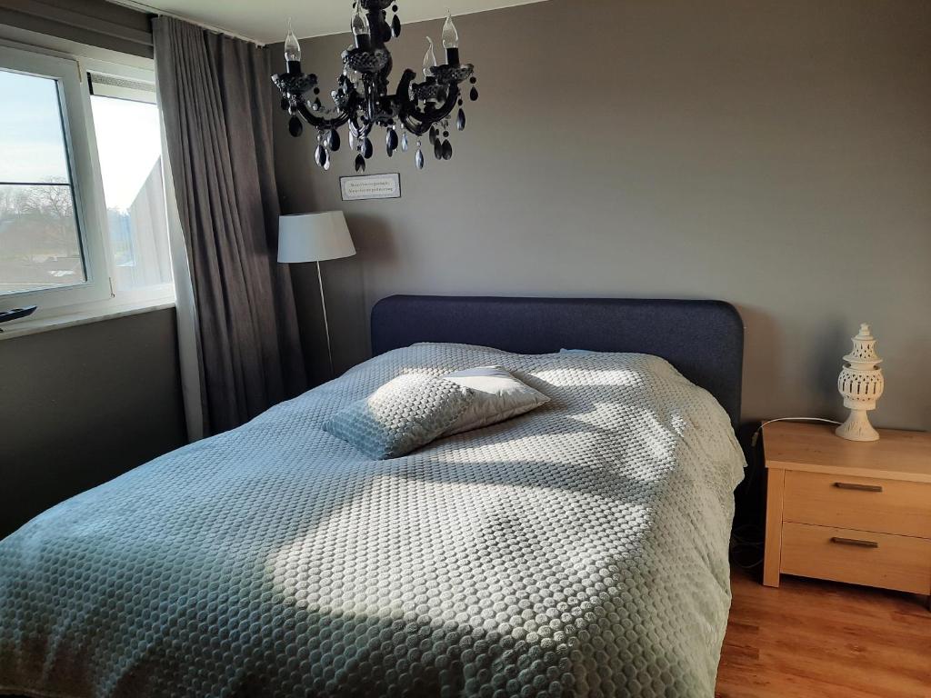 Postel nebo postele na pokoji v ubytování Apartment Nathalie