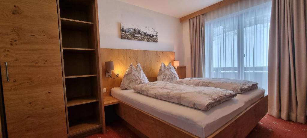 Postel nebo postele na pokoji v ubytování Pension Schweizerhof