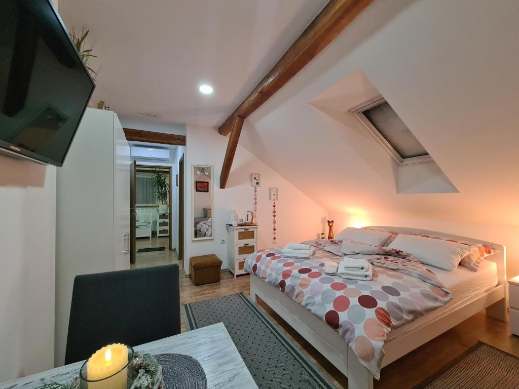 Postel nebo postele na pokoji v ubytování Rooms Garden