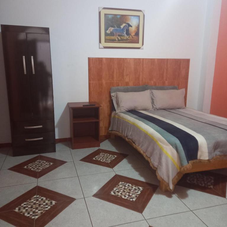 Postel nebo postele na pokoji v ubytování Hostal Luren