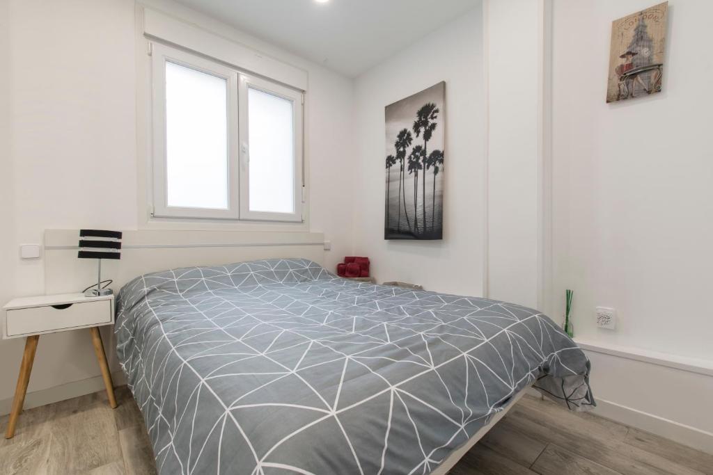 Postel nebo postele na pokoji v ubytování 4Torres Homes - Sofía