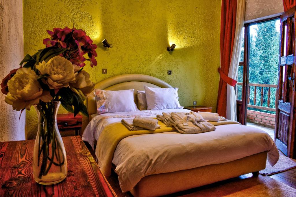 Postel nebo postele na pokoji v ubytování Hotel Polydrosos