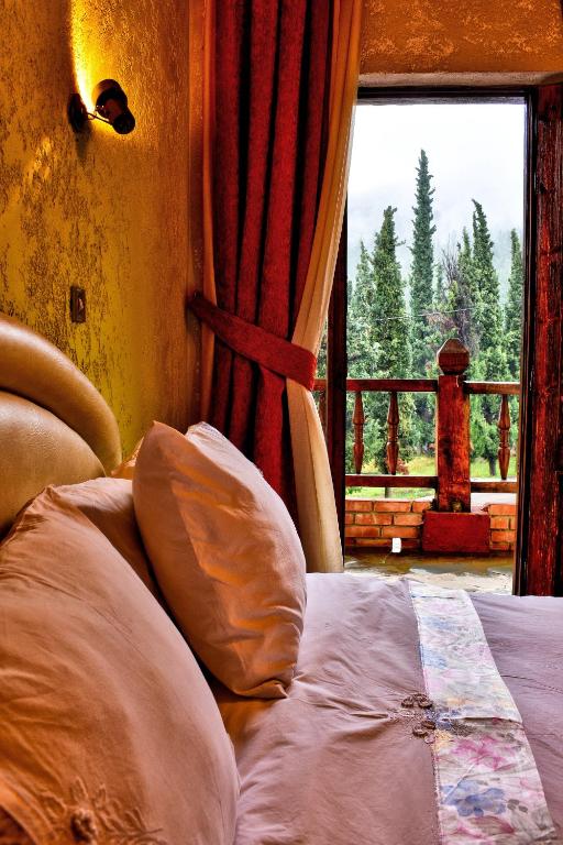 Postel nebo postele na pokoji v ubytování Hotel Polydrosos
