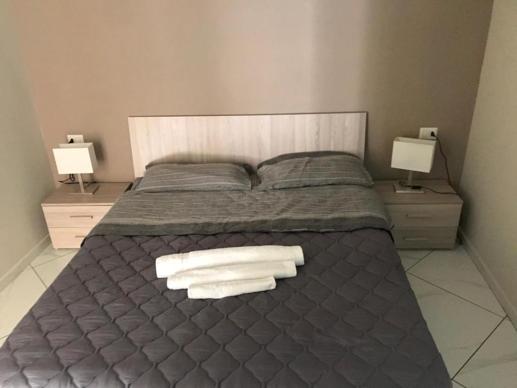 Posteľ alebo postele v izbe v ubytovaní Mignone Luxury House