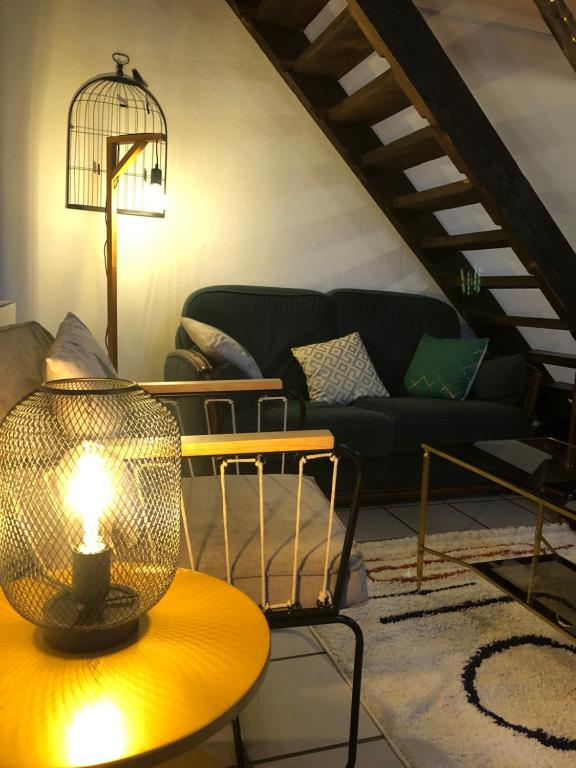 Posezení v ubytování Gîte à la ferme chaleureux avec cheminée
