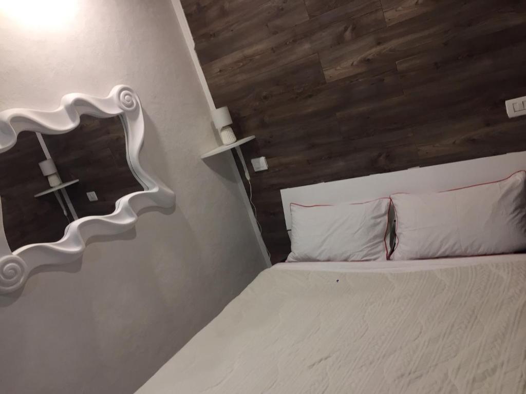 Postel nebo postele na pokoji v ubytování B & Baichin