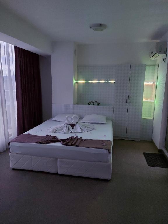 Postel nebo postele na pokoji v ubytování Diamond Kiten