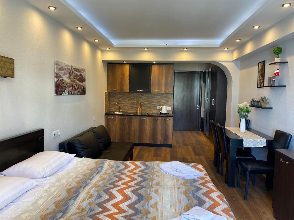 Kuchyň nebo kuchyňský kout v ubytování New Gudauri Alpen Apartments