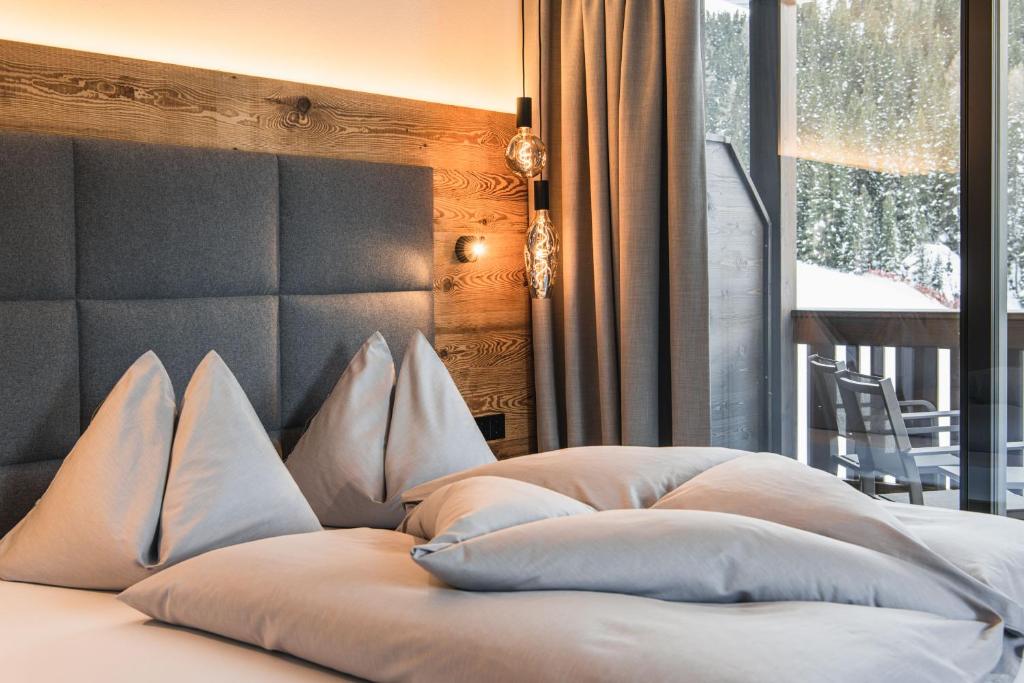 Postel nebo postele na pokoji v ubytování Hotel Wolf