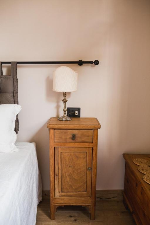 A bed or beds in a room at Corte Mira