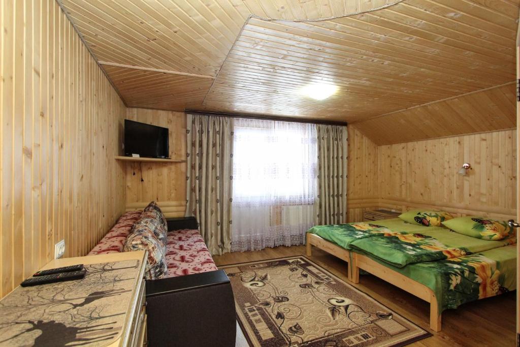 Postel nebo postele na pokoji v ubytování Садиба "У Валентини"