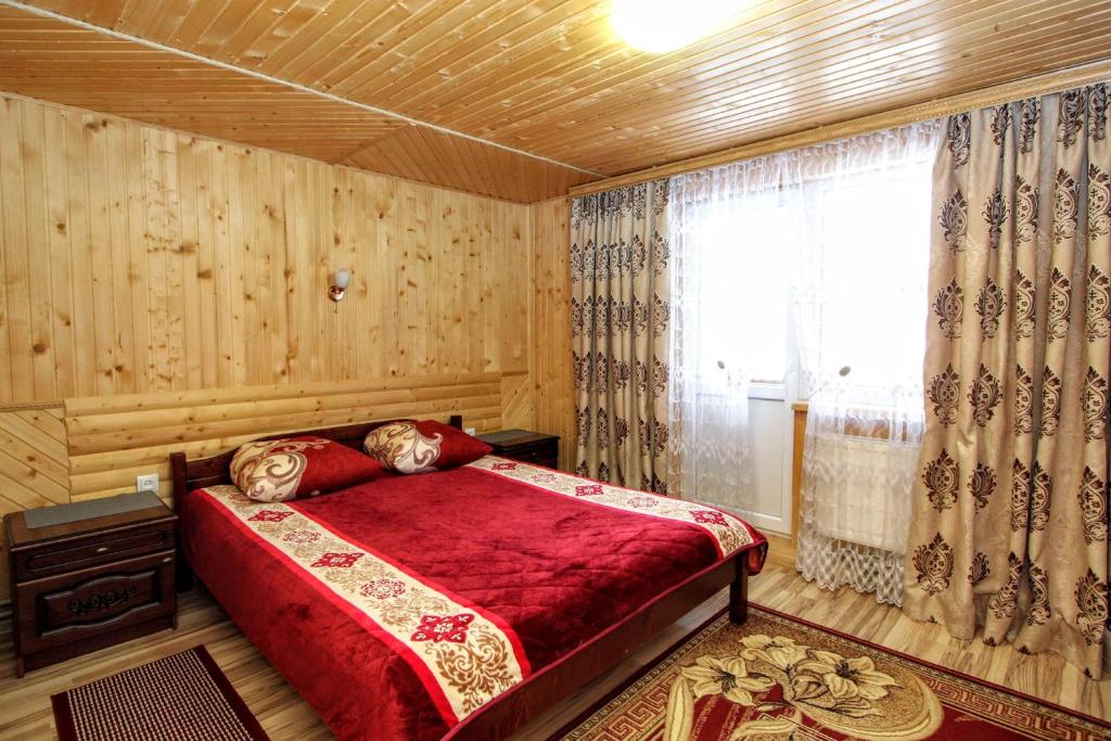 Posteľ alebo postele v izbe v ubytovaní Гостинний комплекс "У Валентини"