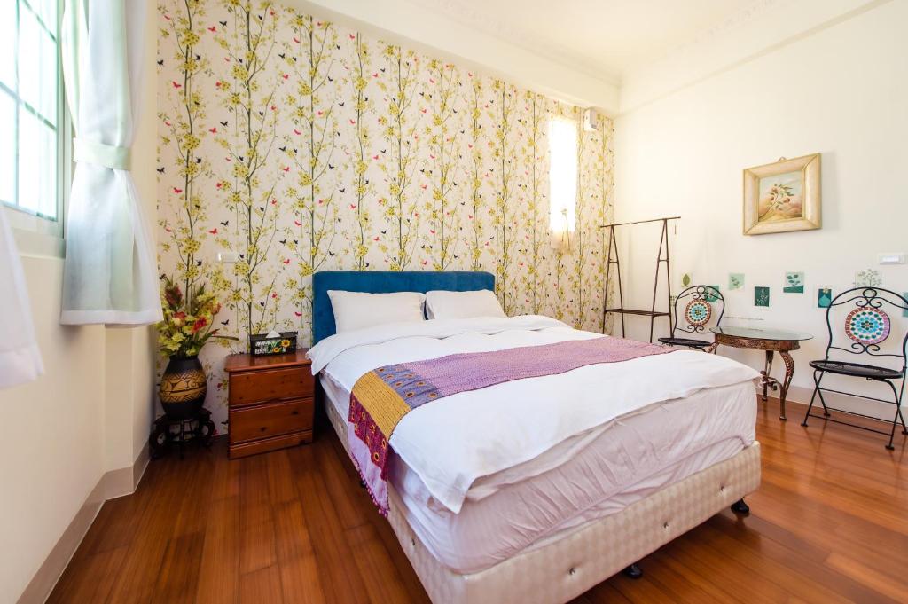 穎軒度假小屋房間的床