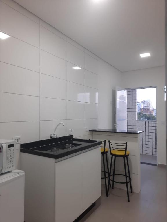 Pousada Suites Enseada Guaruja - Habitación Cuádruple