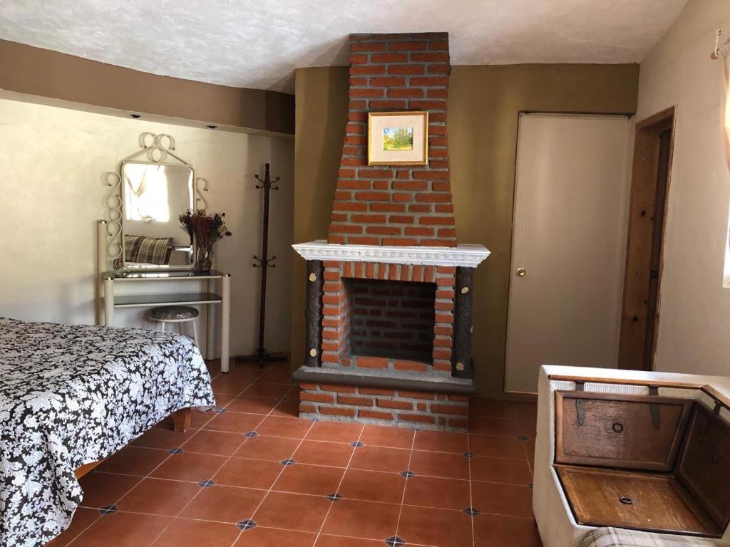 Postel nebo postele na pokoji v ubytování Hotel Real de San Antonio
