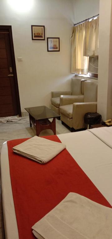 Postel nebo postele na pokoji v ubytování Hotel Aston