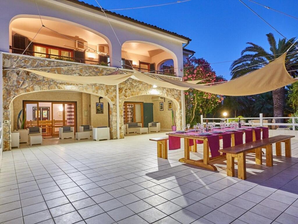 A balcony or terrace at Baroque Bliss Luxurious Villa