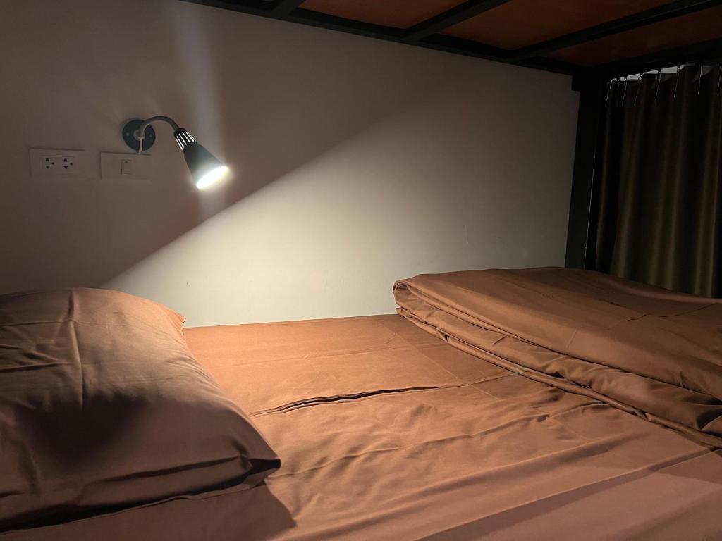 Postel nebo postele na pokoji v ubytování Litera Hostel