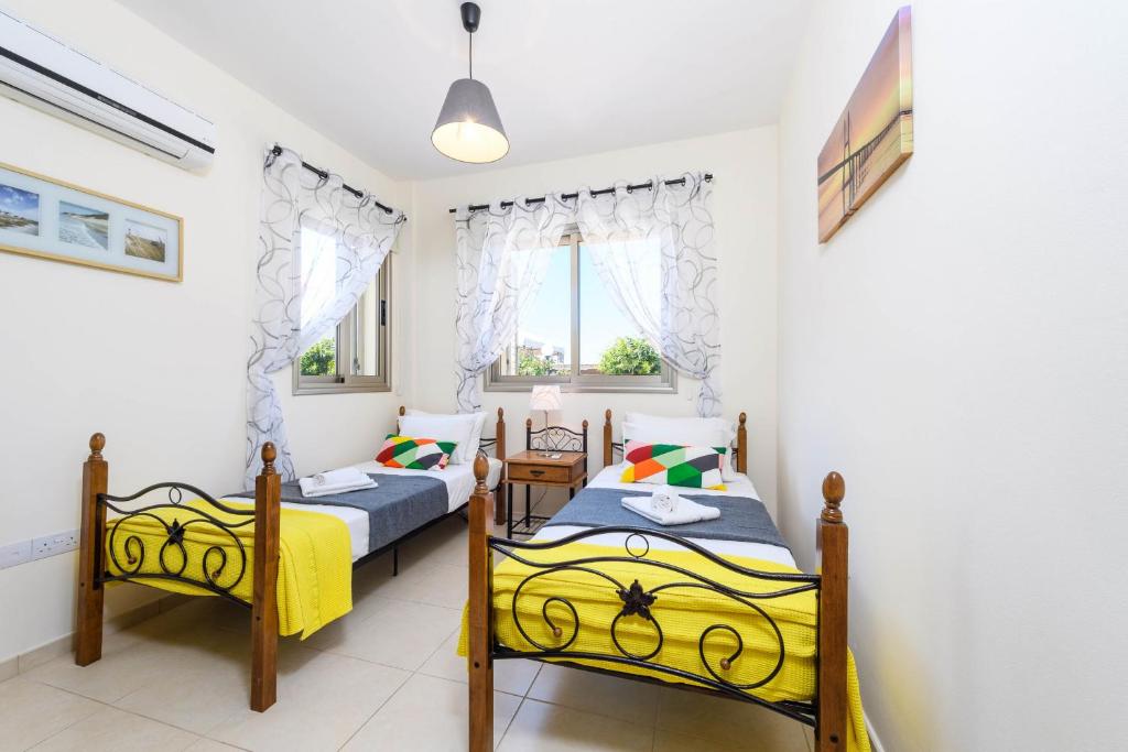 Postel nebo postele na pokoji v ubytování Villa Marizan