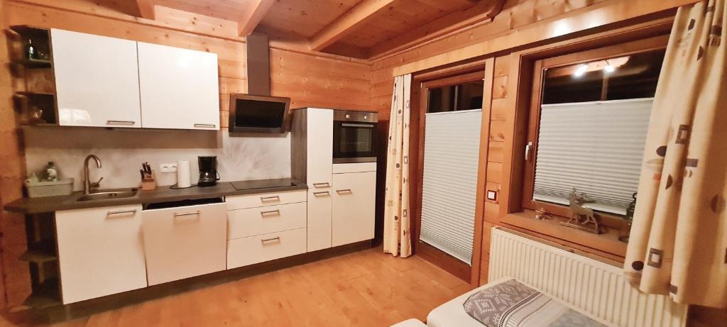 Kuchyň nebo kuchyňský kout v ubytování Appartement Gugganig