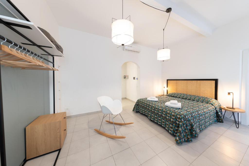 Posteľ alebo postele v izbe v ubytovaní Via Siena 4 - Suites & Rooms
