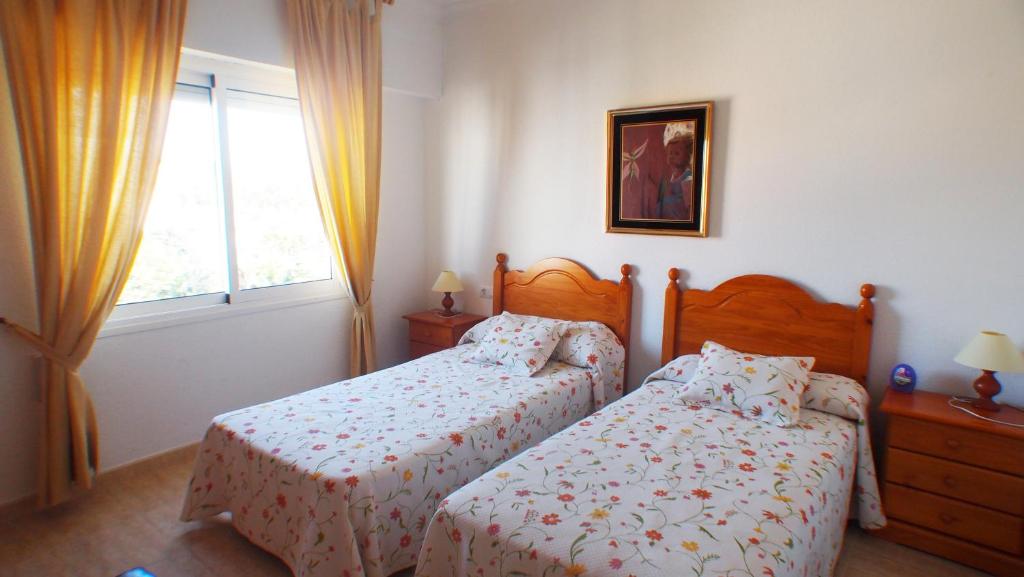 Posteľ alebo postele v izbe v ubytovaní Los Angeles Denia