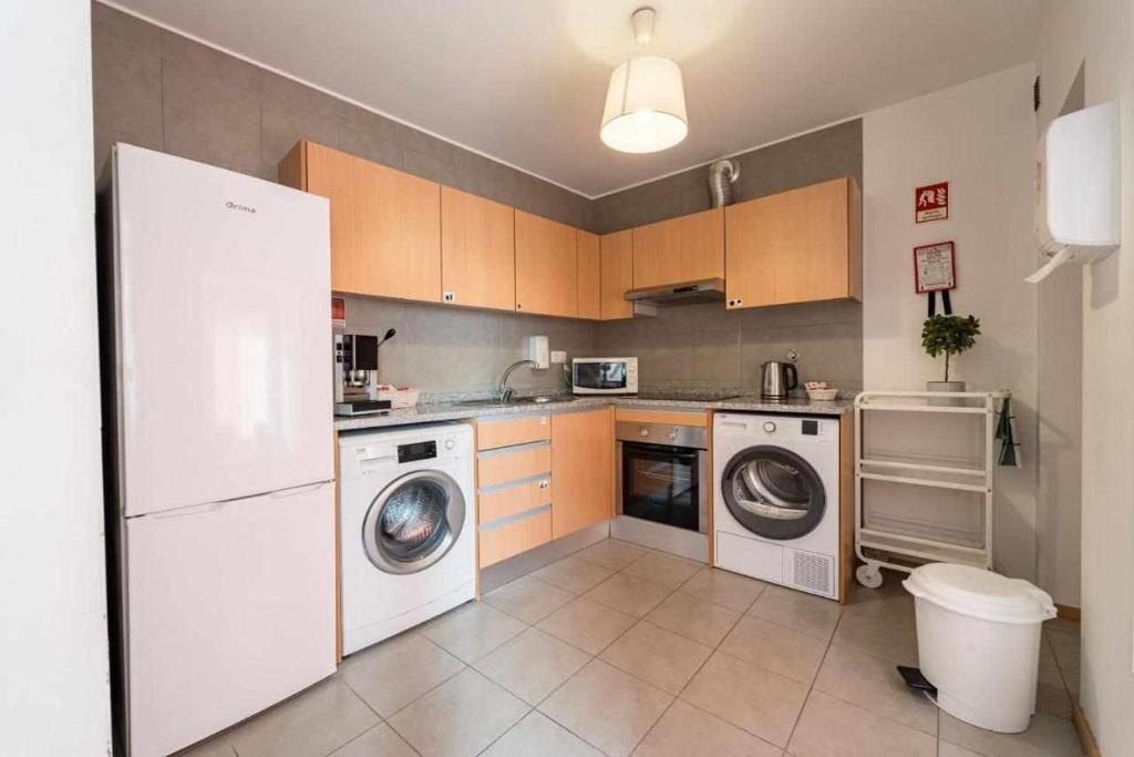 Kuchyň nebo kuchyňský kout v ubytování Sé Guesthouse