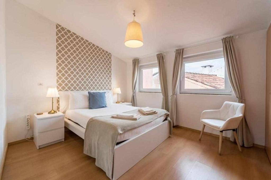 Postel nebo postele na pokoji v ubytování Sé Guesthouse