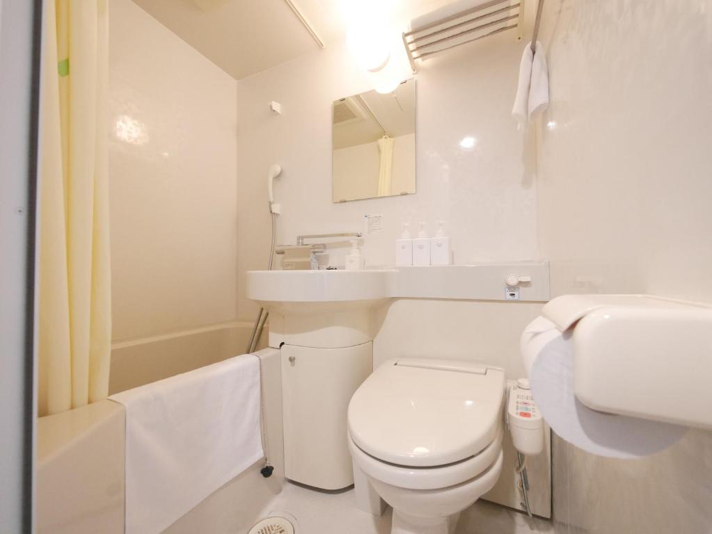 Koupelna v ubytování Hotel Comfybed Ginza